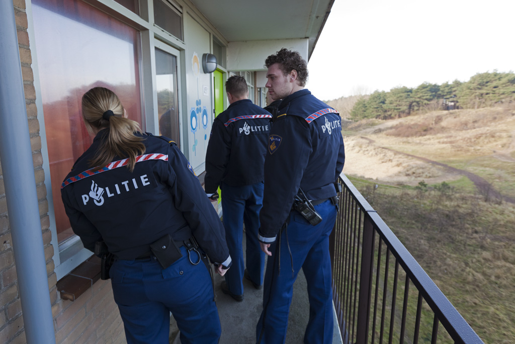 politieagenten voor woning