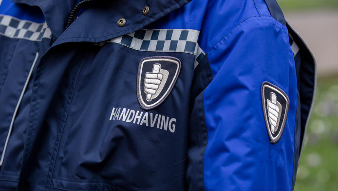 Foto van een opsporingsambtenaar Foto van een opsporingsambtenaar