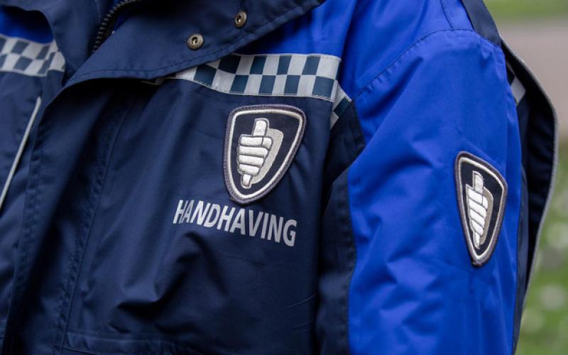 Foto van een opsporingsambtenaar Foto van een opsporingsambtenaar