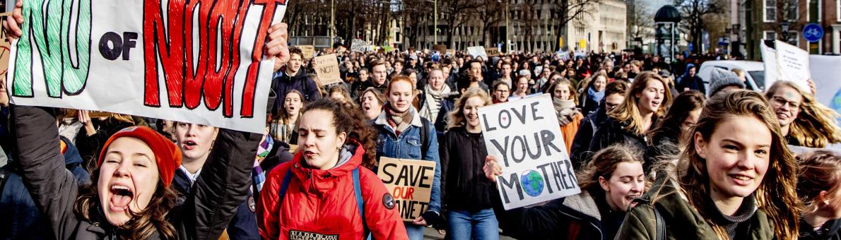 group of people standing together, demonstrating