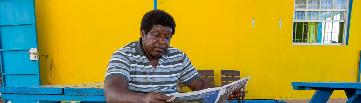 Man reading a newspaper Man reading a newspaper