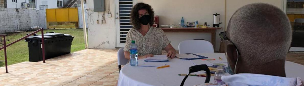 Two people talking at the walk-in sessions at the Dutch Caribbean