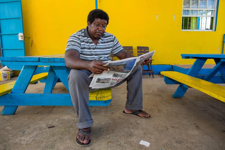 Man reading a newspaper